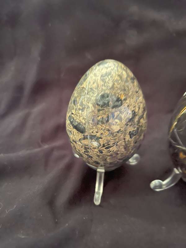Ornaments marble eggs stands
