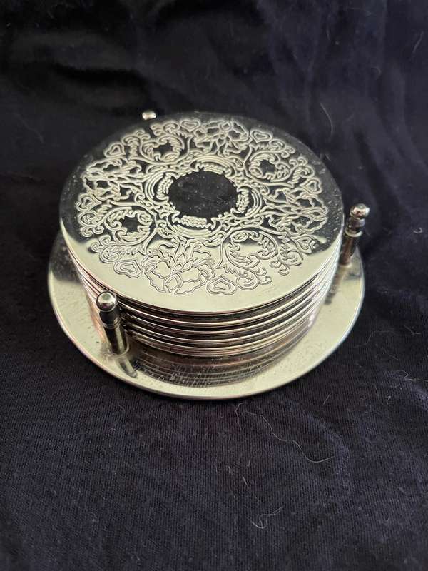 Coasters stand silver plated