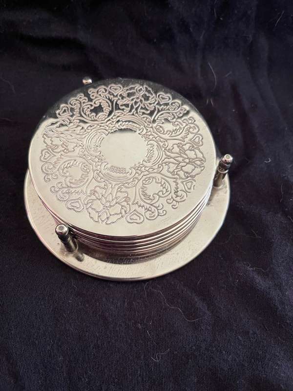 Coasters stand silver plated