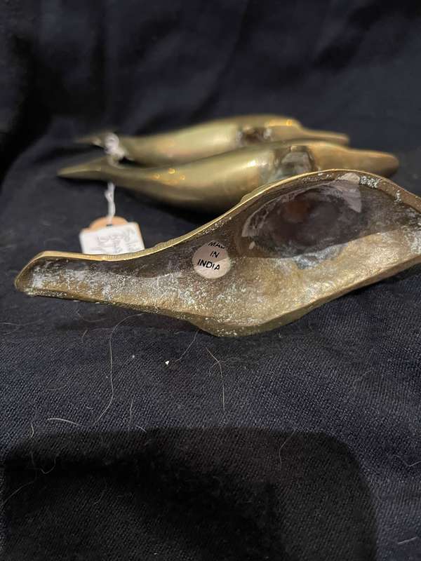Ornament brass dolphins