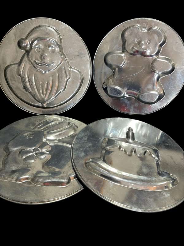 Cake tins vintage each