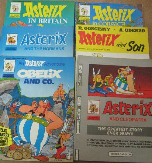 6 soft cover Asterix editions plus one hard cover edition