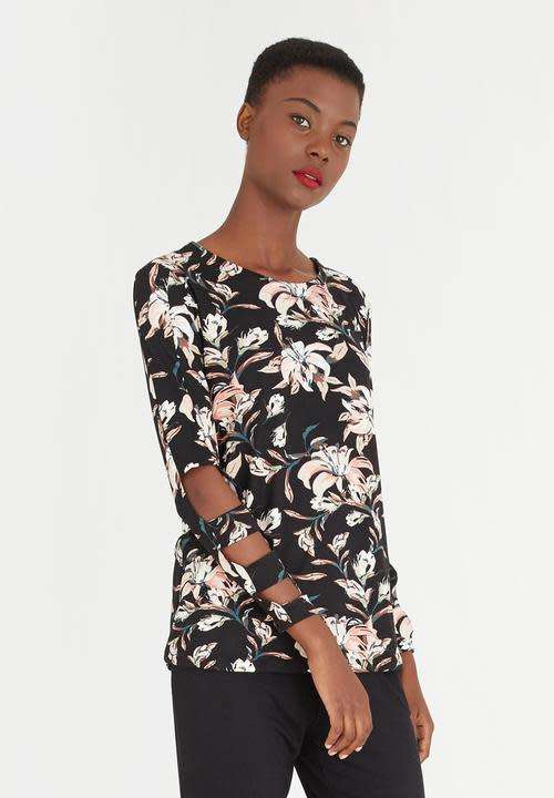Designer floral top with cutout detail