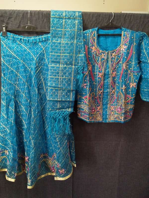 Blue and gold sari top and flare skirt