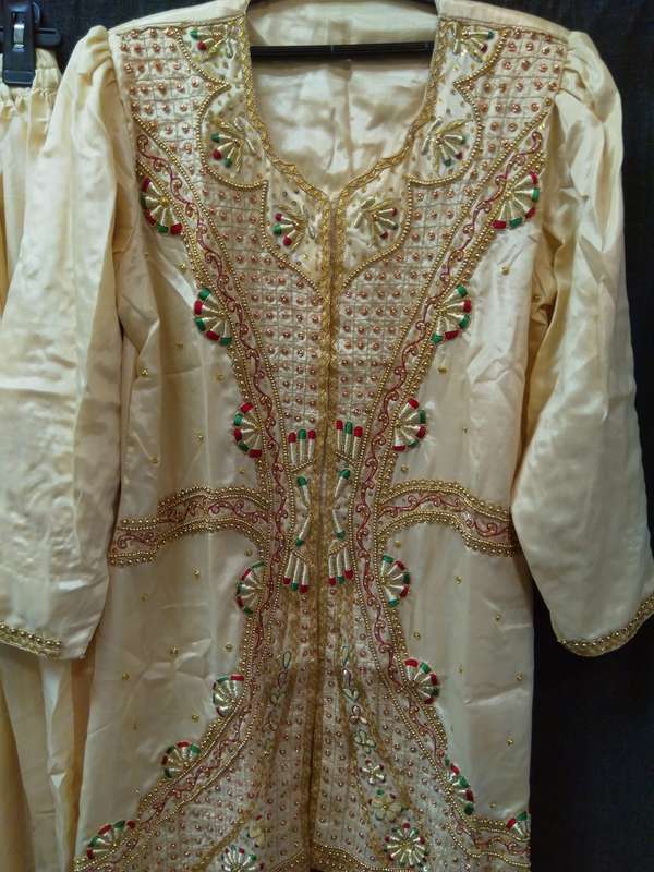 Cream and gold rich embroidery long sari top and skirt set
