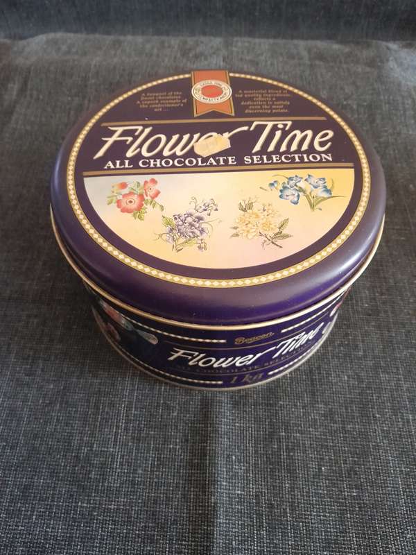 Vintage round biscuit storage tin