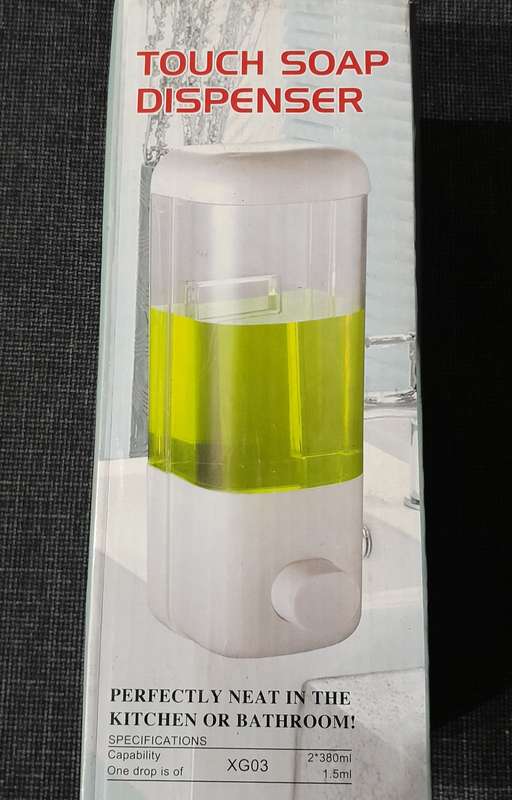 Wall mounted liquid soap dispenser White