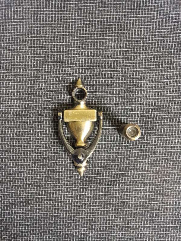 Vintage door knocker with peephole door viewer