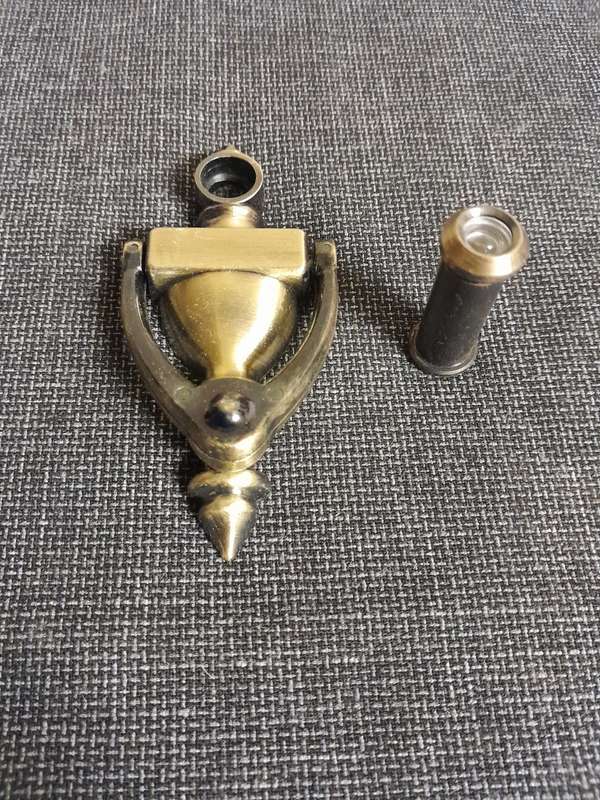 Vintage door knocker with peephole door viewer