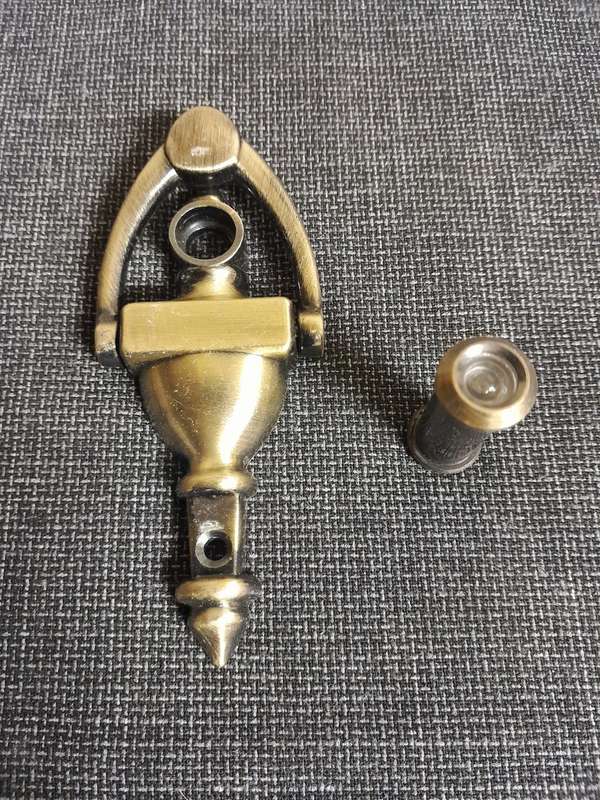 Vintage door knocker with peephole door viewer