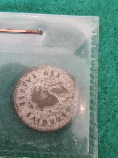 2 ANTIQUE SOUTH AFRICAN 3D COINS (TIKI)