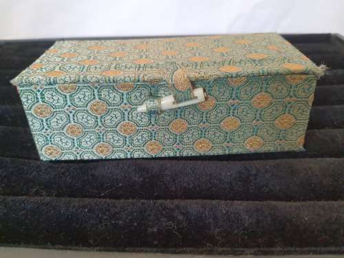 AN ANTIQUE CHINESE OR JAPANESE PERSON STAMP