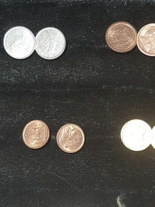 A JOBLOT COIN CUFFLINKS
