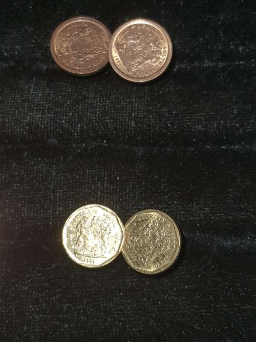 A JOBLOT COIN CUFFLINKS