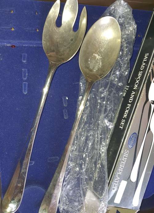 A SET OF GENUINE SILVER PLATED SALAD SPOON AND FORK SET