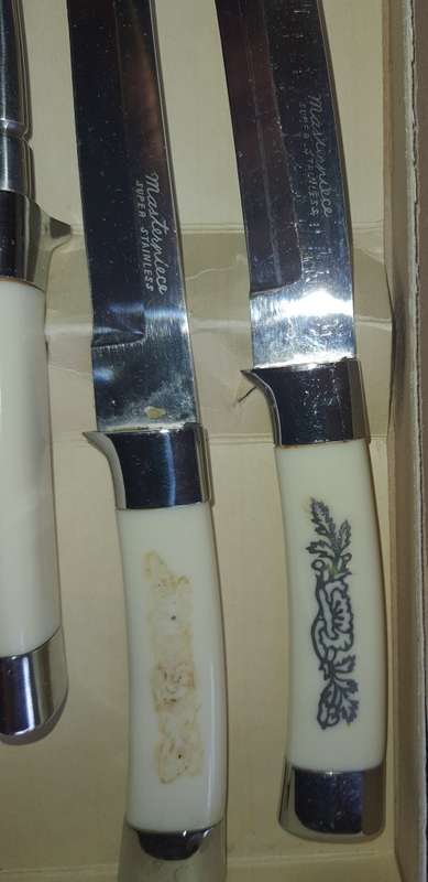 A 4 PIECE CARVING SET WITH WHITE INLAID HANDLE  MASTER PIECE STAINLESS STEEL