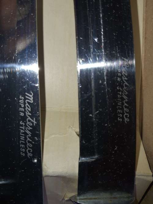 A 4 PIECE CARVING SET WITH WHITE INLAID HANDLE  MASTER PIECE STAINLESS STEEL