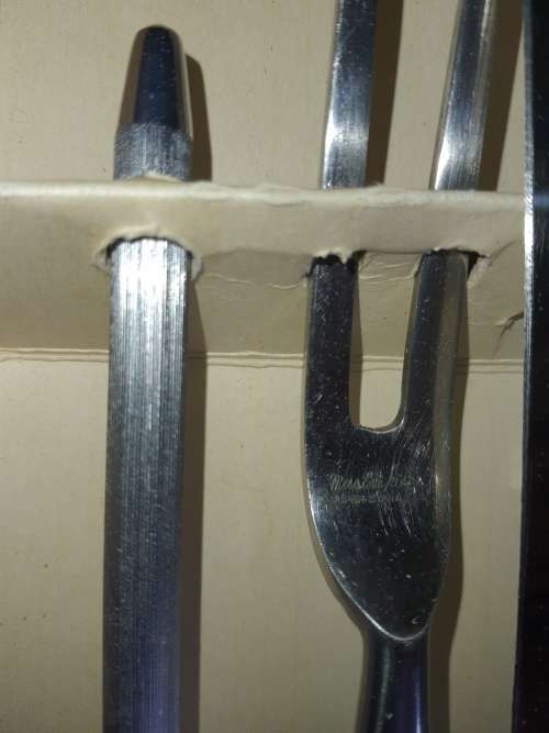 A 4 PIECE CARVING SET WITH WHITE INLAID HANDLE  MASTER PIECE STAINLESS STEEL