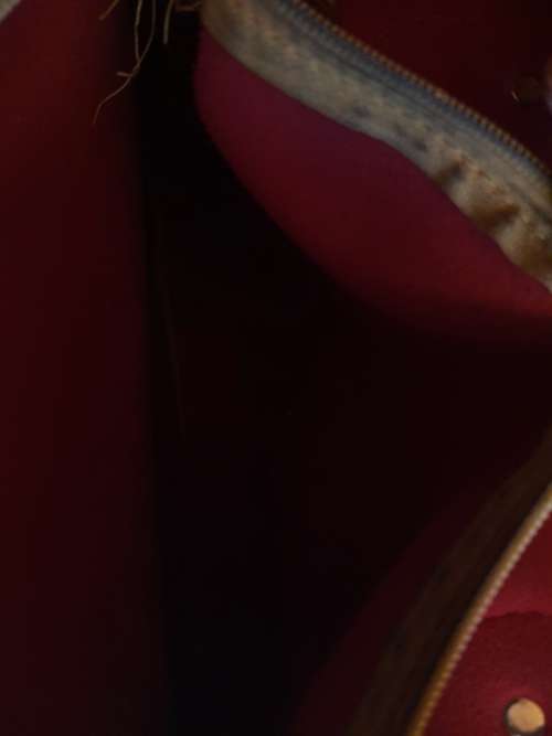 A  BROWN VIRTUALLY BRAND NEW MICHEAL KORES LEATHER TYPE HAND BAG