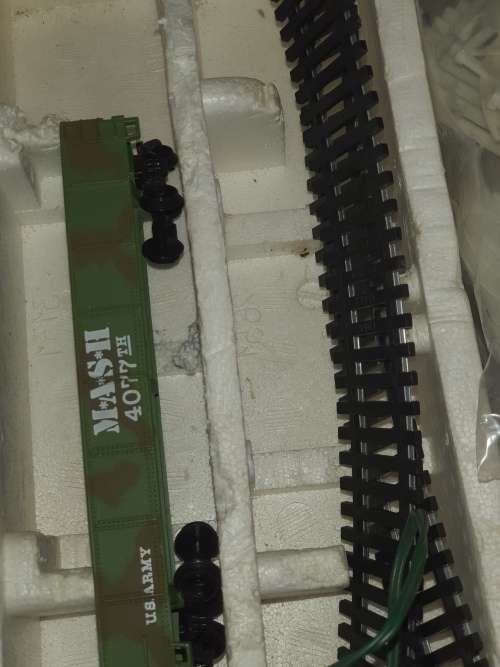A VINTAGE MODEL TOY TRAIN SET SOLD AS IS, NOT SURE IF IT IS COMPLETE