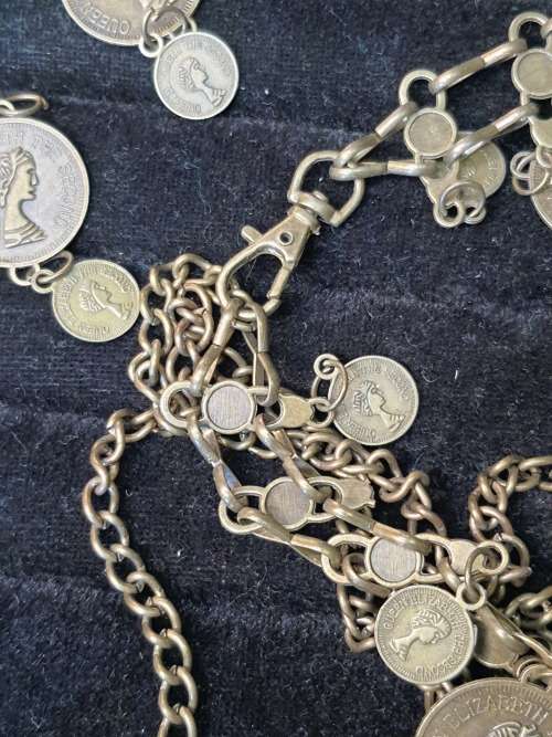 A VINTAGE ORNATE COIN BRONZE NECKLACE WITH 2 COINS LOOSE SOLD AS IS