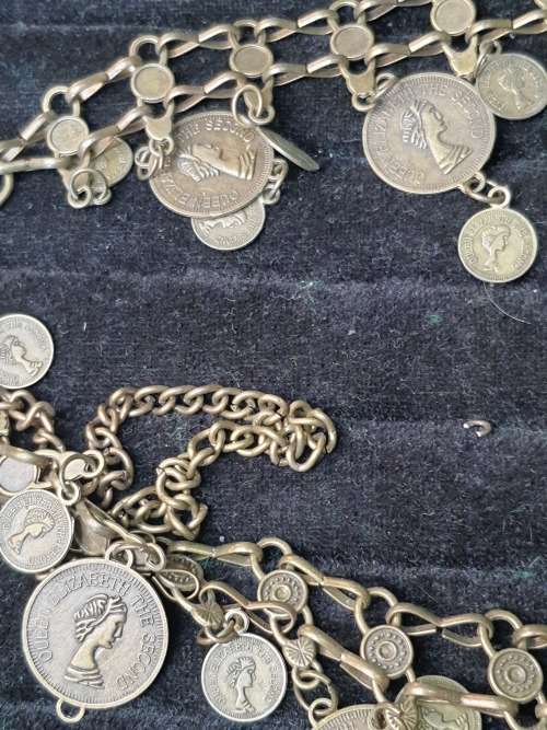 A VINTAGE ORNATE COIN BRONZE NECKLACE WITH 2 COINS LOOSE SOLD AS IS
