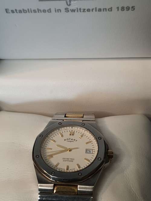 GENUINE ROTARY MENS WATCH WITH ALL DOCUMENTATION AND ITS ORIGINAL BOX SOLD AS IS NOT TESTED