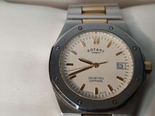 GENUINE ROTARY MENS WATCH WITH ALL DOCUMENTATION AND ITS ORIGINAL BOX SOLD AS IS NOT TESTED