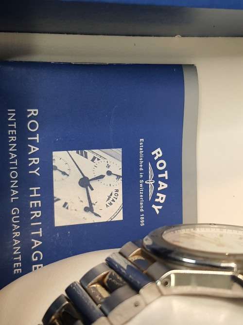 GENUINE ROTARY MENS WATCH WITH ALL DOCUMENTATION AND ITS ORIGINAL BOX SOLD AS IS NOT TESTED