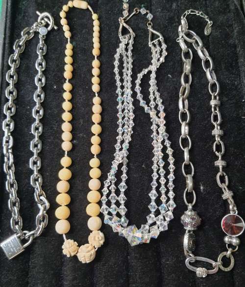 AS COLLECTION OF COSTUME NECKLACES SOLD AS IS