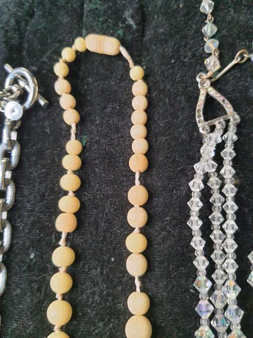 AS COLLECTION OF COSTUME NECKLACES SOLD AS IS