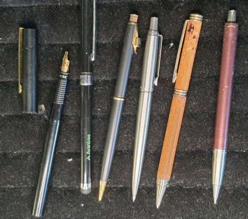 a JOBLOT PENS AND a FOUNTAIN PEN SOLD AS IS