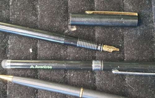 a JOBLOT PENS AND a FOUNTAIN PEN SOLD AS IS