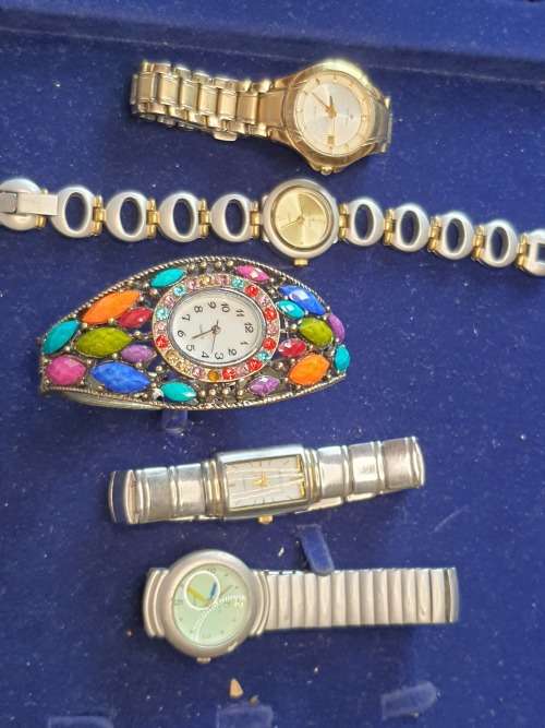A jab lot quartz woman`s wrist watches sold as is not tested