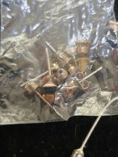 A COLLECTION OF VINTAGE STUD AND DROP EARRINGS SOLD AS IS