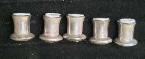 A VINTAGE COLLECTUON OF EPNS MINITURE SALT AND PEPPER DISPENSORS