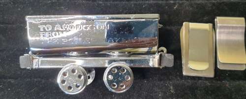 A VINTAGE ORNAMENTAL MINING CARRIAGE DESK TOP AND 2 GENTLEMENS MONEY CLIPS STAINLESS TEEEL SOLD AS