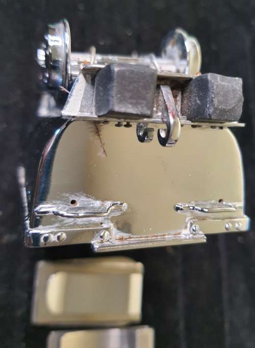 A VINTAGE ORNAMENTAL MINING CARRIAGE DESK TOP AND 2 GENTLEMENS MONEY CLIPS STAINLESS TEEEL SOLD AS
