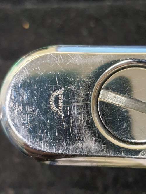 A RENAULT CIGGARETTE LIGHTER SOLD AS IS