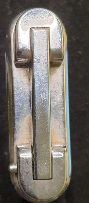A RENAULT CIGGARETTE LIGHTER SOLD AS IS