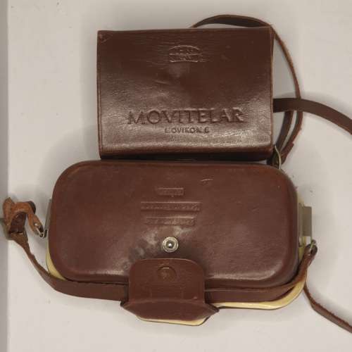 AN ANTIQUE MOVIE CAMERA  A ZEIS IKON MOVIENETTE COMPLETE WITH ATTACTMENTS