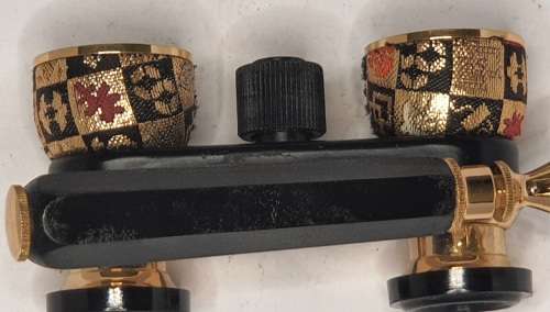 A VINTAGE LADIES OPERA BINOCULARS WITH FANCY TAPESTRY DESIGN BOTH THE BINOCULARS AND THE CASE SOLD A