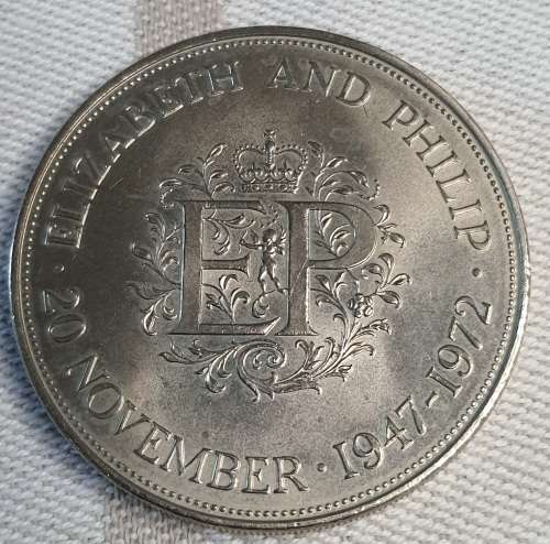 A HIGHLY COLLECTABLE QUEEN AND PRINCE BRITISH ROYAL SILVER COIN 1947 TO 1972 SOLD AS IS