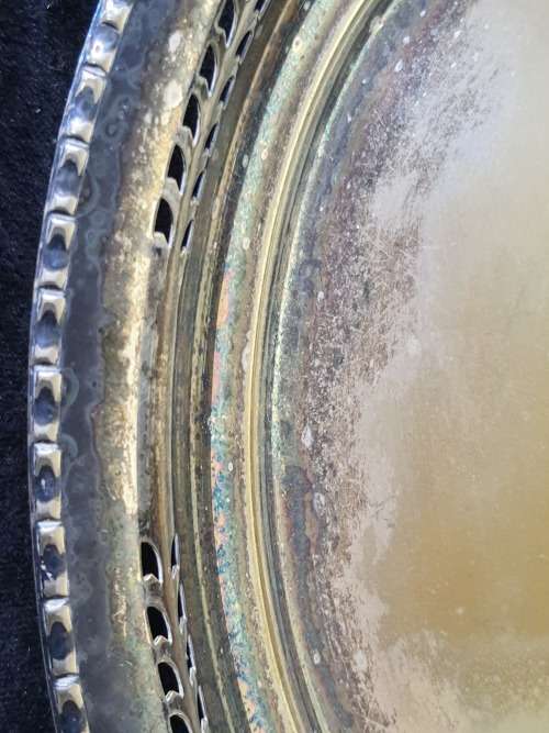 A VINTAGE OVAL EPNS SERVING TRAY SOLD AS IS