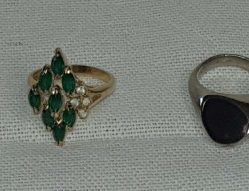 A VINTAGE COLLECTION OF DRESS RINGS SOLD AS IS