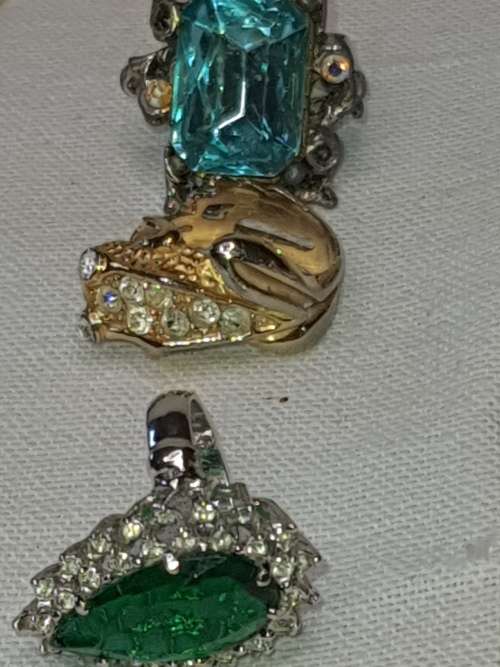A VINTAGE COLLECTION OF DRESS RINGS SOLD AS IS