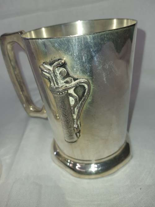 TWO SILVER PLATED SPORTING BEER VINTAGE MUGGS SOLD AS IS