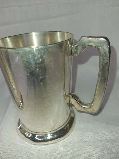 TWO SILVER PLATED SPORTING BEER VINTAGE MUGGS SOLD AS IS