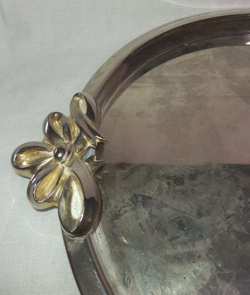 A VINTAGE STAINLESS STEEL WITH GOLD TONE HANDLES SERVING TRAY SOLD AS IS