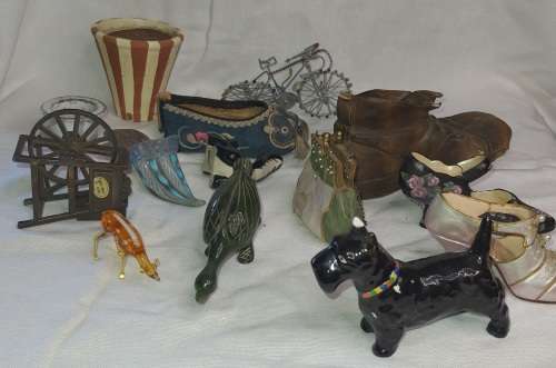 A VINTAGE COLLECTION OF MINITURE MIXED FIGURINES SOLD AS IS